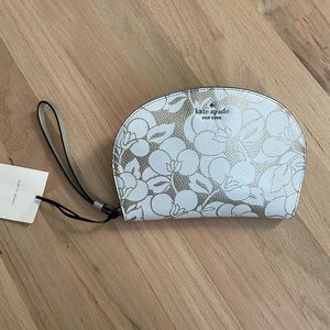White and silver Kate Spade clutch